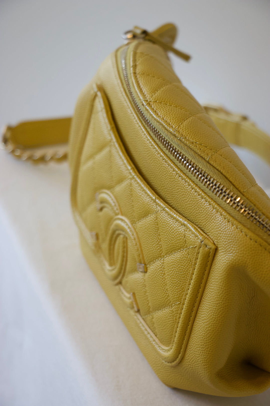 Chanel Filigree Wallet on Chain Yellow side