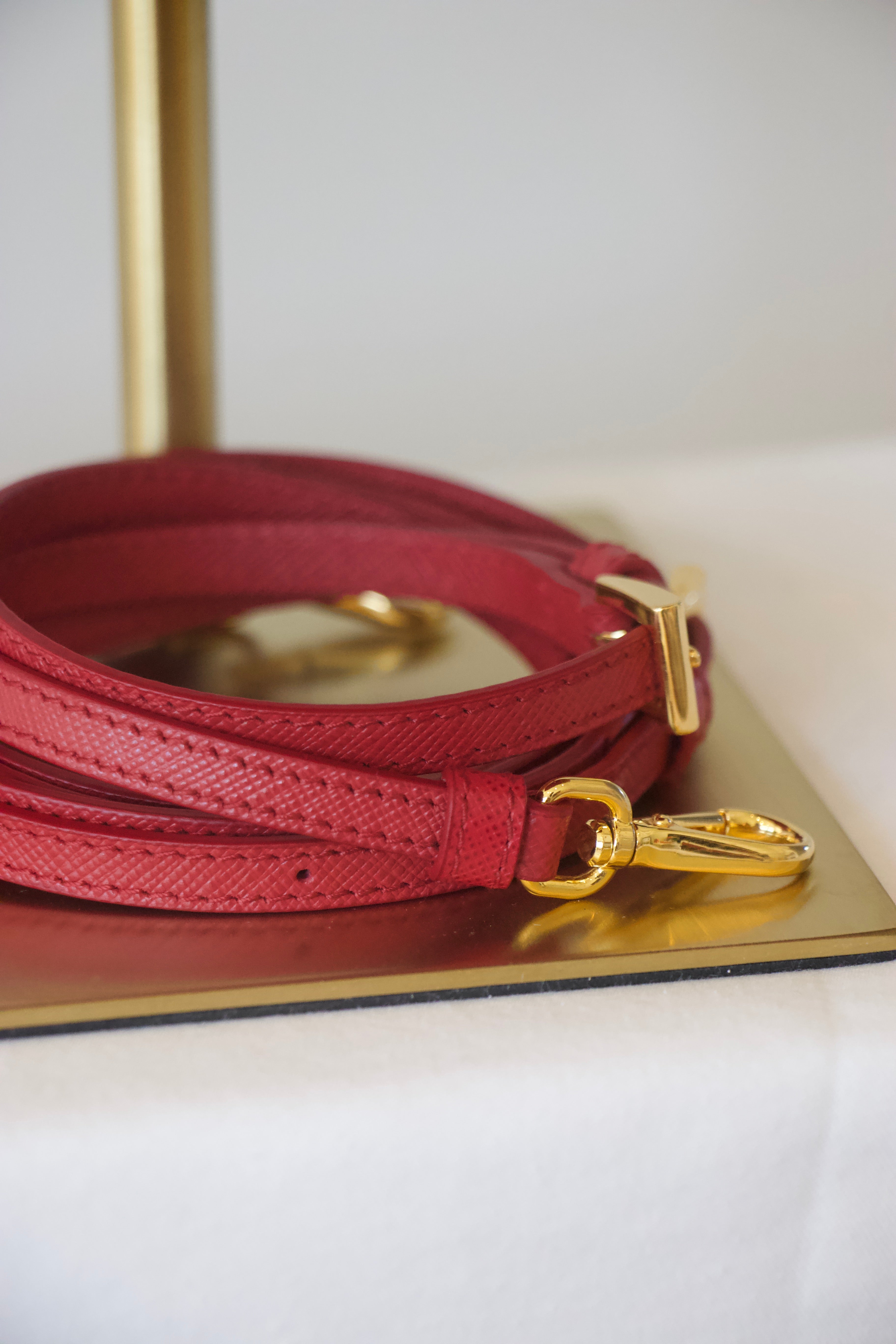 Prada Enameled Metal Triangle Bucket Bag