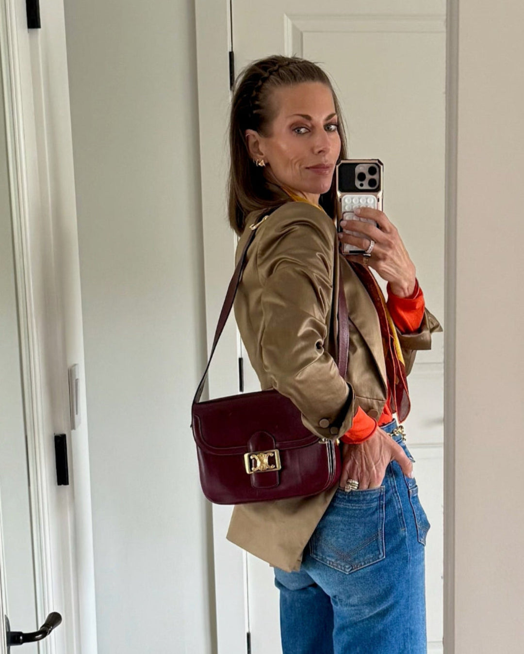 Celine_Triomphe_Leather_Handbag on model mirror