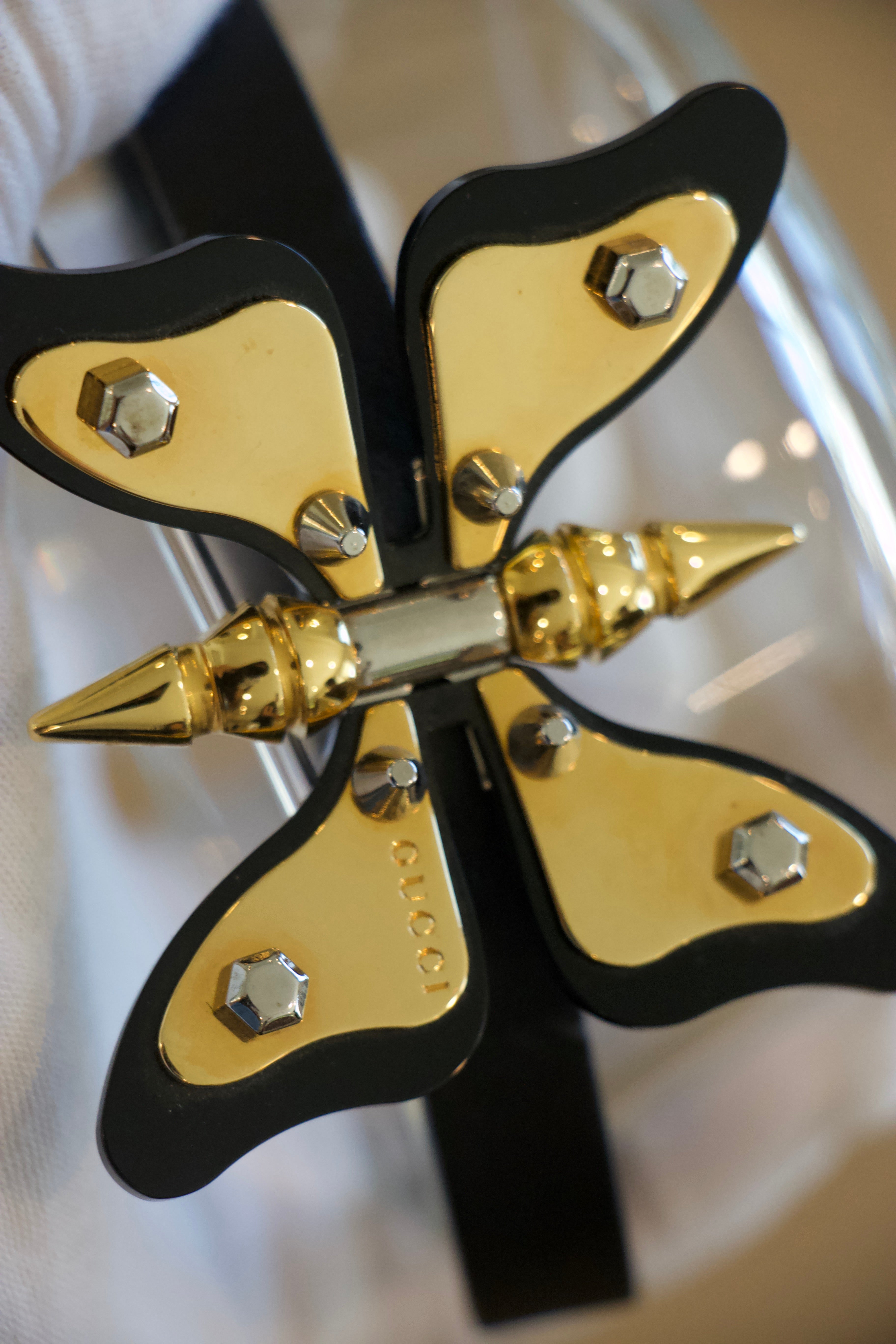 Gucci leather choker butterfly necklace close up