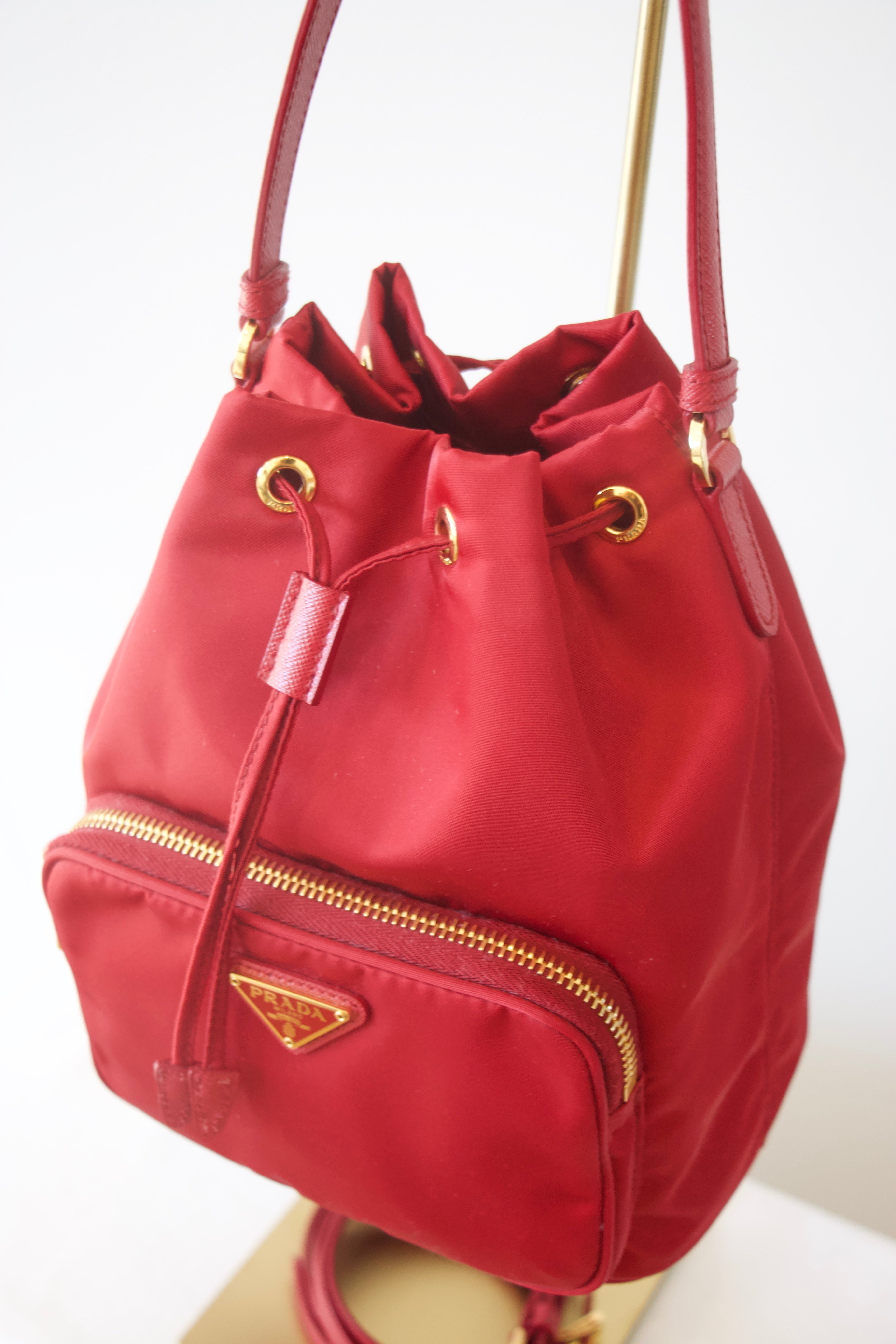Prada Enameled Metal Triangle Bucket Bag