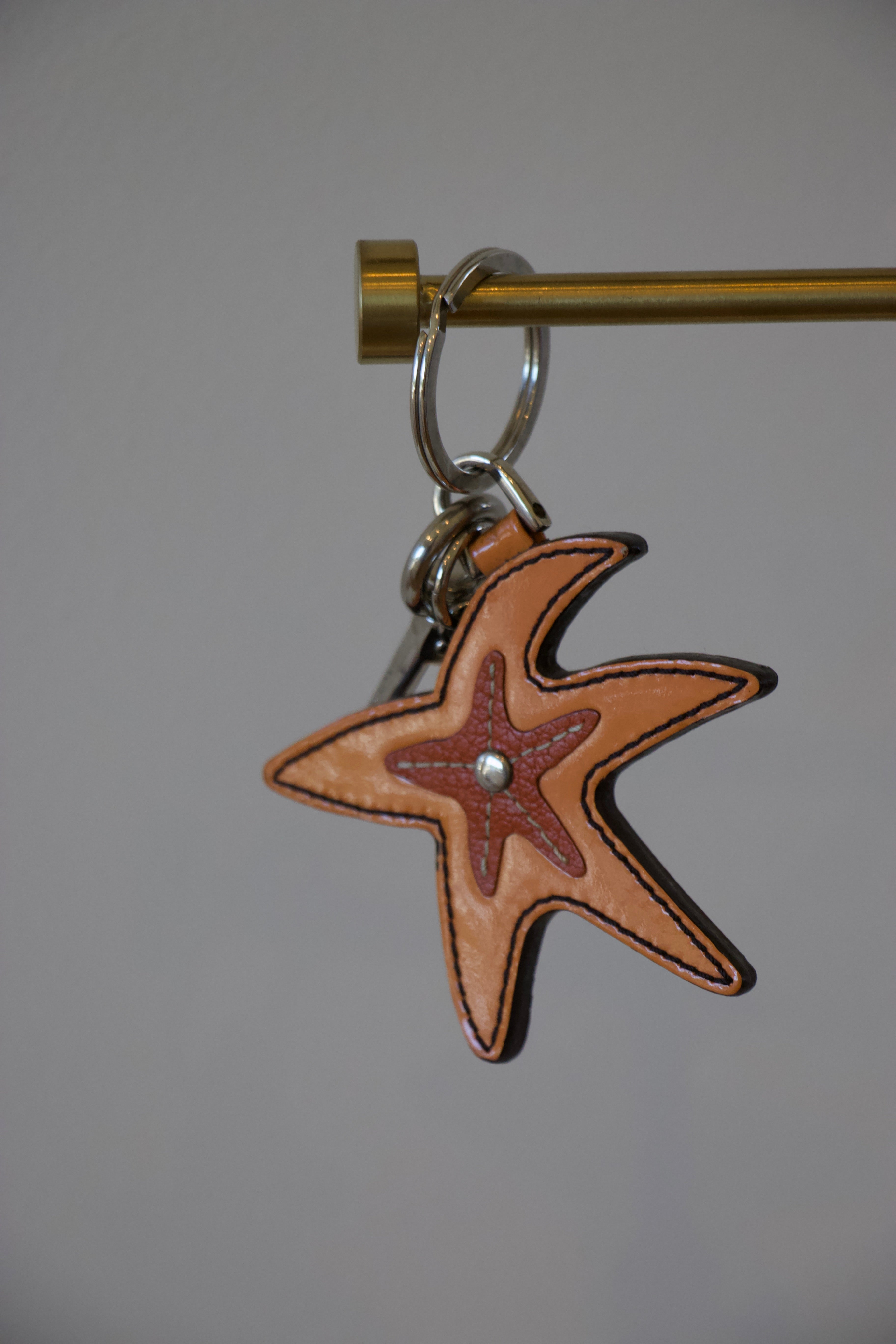 Prada Orange Leather Starfish Keychain